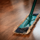 Cleaning mop on wood floor